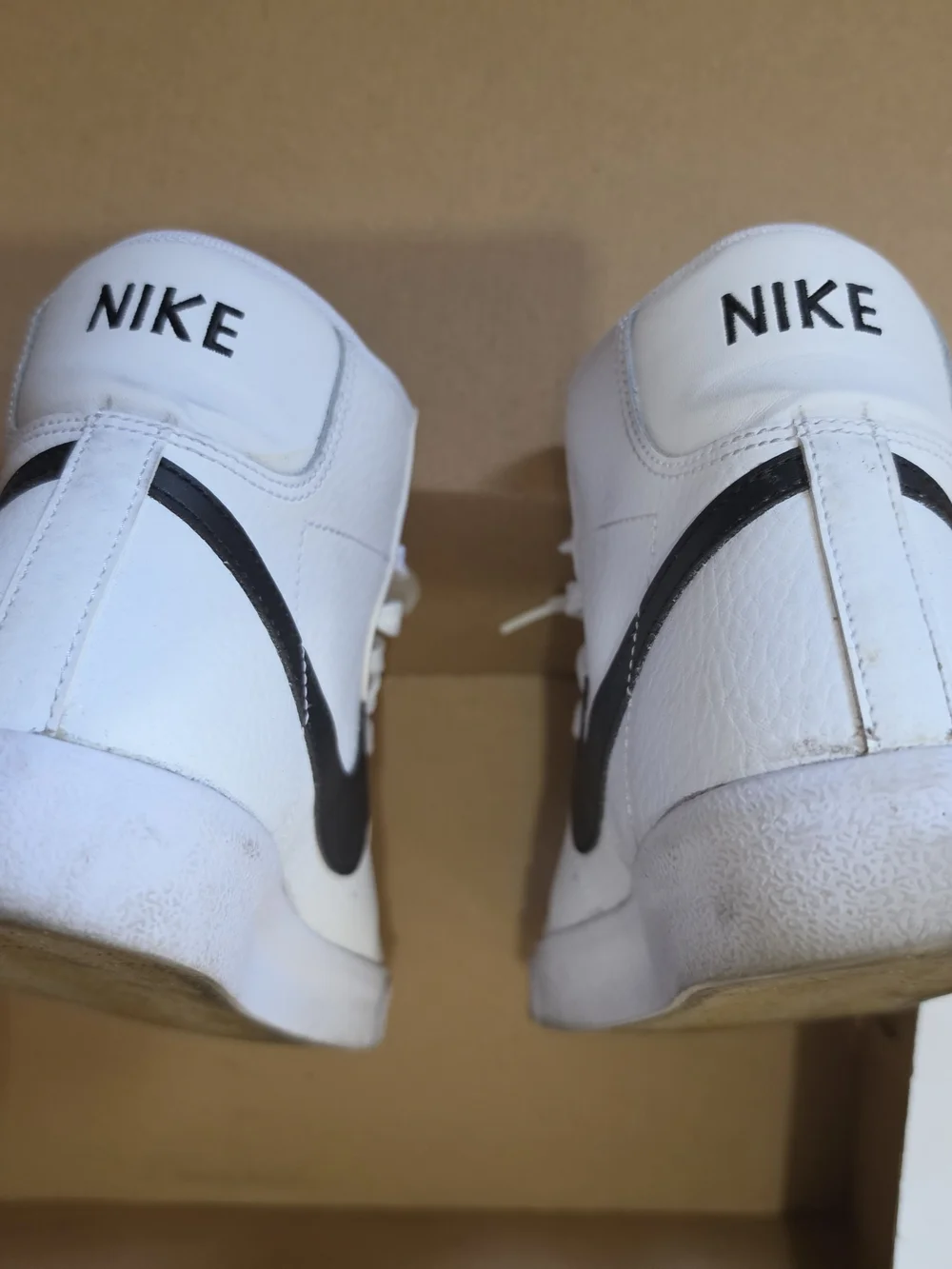 Nike Blazer White High-Top Sneakers with Black Swoosh